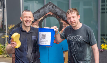 Craig Scott and Ste Roberts Brave the Soaking for Cancer Research UK at Annual Staff Sponging Event
